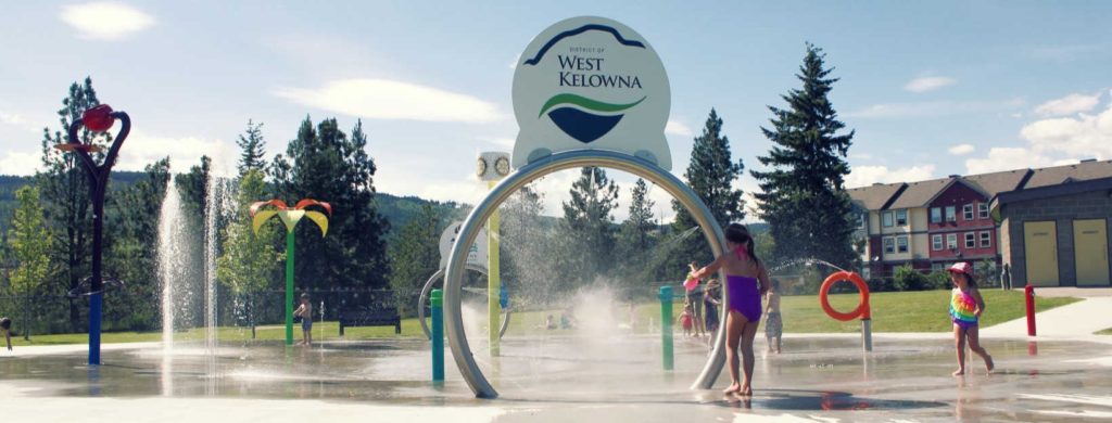 kids spray park west kelowna cool down